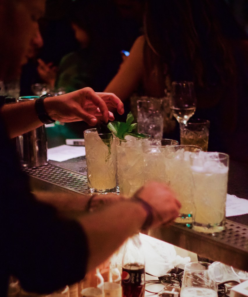 mixologist bartender creating cocktails